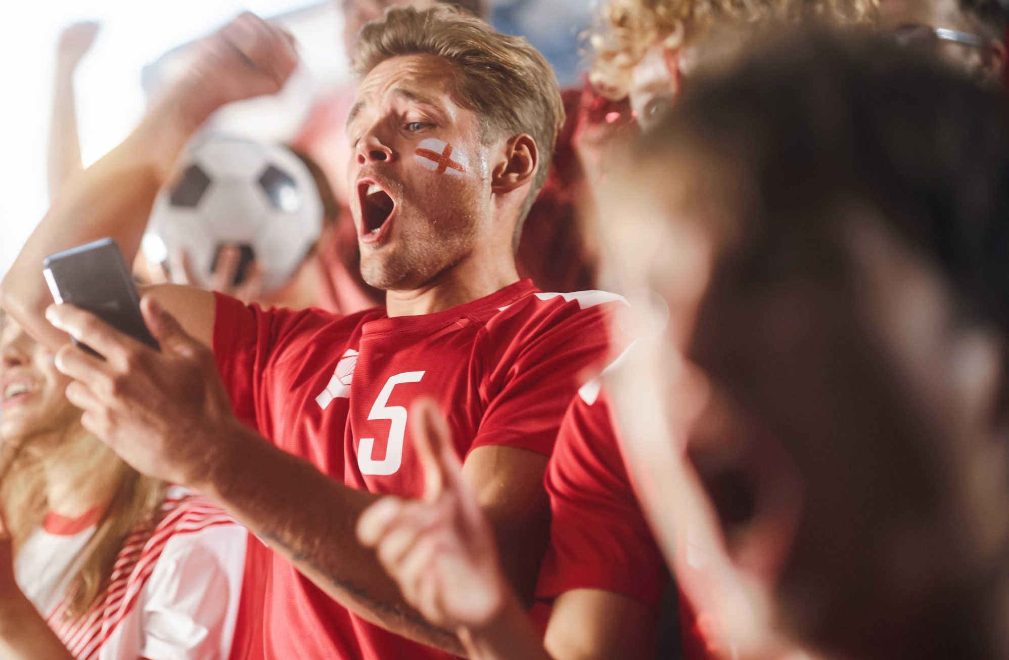 Sport Stadium Soccer Match: Caucasian Man Using Smartphone Cheer